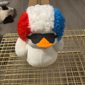 Plush Toy with Red, White, and Blue Afro